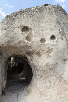 Georgia, Uplistsikhe. A room carved into a cliff face Georgia, Uplistsikhe. A room carved into a cliff face