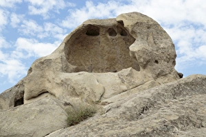 Georgia, Uplistsikhe. A section of carved stone holes Georgia, Uplistsikhe. A section of carved stone holes