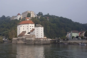Germany, Passau. Confluence of Danube & Ilz rivers in front of the historic Veste Germany, Passau. Confluence of Danube & Ilz rivers in front of the historic Veste