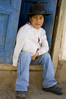 Girl sitting in doorway, Huaripampa (near Huaraz), Peru. (MR) Girl sitting in doorway, Huaripampa (near Huaraz), Peru. (MR)