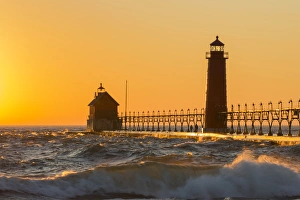 Grand Haven South Pier Lighthouse at sunset on Lake Michigan, Ottawa County, Grand Haven Grand Haven South Pier Lighthouse at sunset on Lake Michigan, Ottawa County, Grand Haven