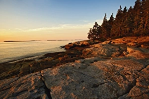 Granite shoreline of Rockport Harbor at sunrise, Rockport, Maine Granite shoreline of Rockport Harbor at sunrise, Rockport, Maine