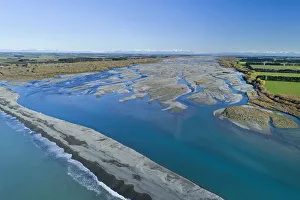 Gravel bar at mouth of Rakaia River, Mid Canterbury, South Island, New Zealand Gravel bar at mouth of Rakaia River, Mid Canterbury, South Island, New Zealand