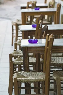 <b class=qtipBold><figcaption>Greece, CRETE</figcaption></b><br>Greece, CRETE, Hania Province, Hania: Venetian Port / Cafe Table / Dawn<br><em>© Copyright Walter Bibikow / DANITA DELIMONT, AGENT</em> Greece, CRETE