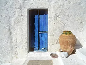 Jim Nilsen Gallery: Greece, Symi. Blue door and pot. Credit as: Jim Nilsen / Jaynes Gallery / DanitaDelimont