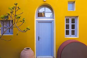 Greece, Thira. Colorful house exterior. Credit as: Jim Nilsen / Jaynes Gallery / DanitaDelimont Greece, Thira. Colorful house exterior. Credit as: Jim Nilsen / Jaynes Gallery / DanitaDelimont