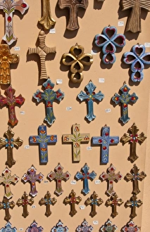Greek religious cross for sale in store in Oia in Greek Islands of Santorini in Greece Greek religious cross for sale in store in Oia in Greek Islands of Santorini in Greece