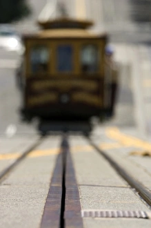 Ground level view of an approaching San Francisco cable car Ground level view of an approaching San Francisco cable car