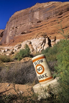 Grounded buoy in Forgotten Canyon at location once 80 feet below the surface of Lake Powell Grounded buoy in Forgotten Canyon at location once 80 feet below the surface of Lake Powell