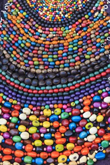 Group of beaded necklaces for sale at an antique market Group of beaded necklaces for sale at an antique market