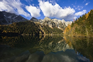 The high mountains of the Rieserferner Alps are reflecting in the Antholzer See The high mountains of the Rieserferner Alps are reflecting in the Antholzer See