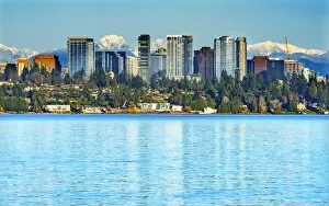 Suburbia Gallery: High-rise buildings, Lake Washington and snowcapped Cascade Mountains, Bellevue