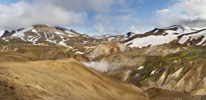 Hikers in the geothermal area Hveradalir in the mountains Kerlingarfjoll in the highlands Hikers in the geothermal area Hveradalir in the mountains Kerlingarfjoll in the highlands