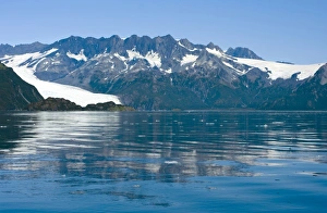 Holgate Glacier calves into Aialik Bay in Kenai Fjords National Park Alaska Holgate Glacier calves into Aialik Bay in Kenai Fjords National Park Alaska