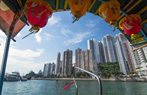 Hong Kong China Aberdeen from boat in water of reclaimed land with sktscraper condos Hong Kong China Aberdeen from boat in water of reclaimed land with sktscraper condos
