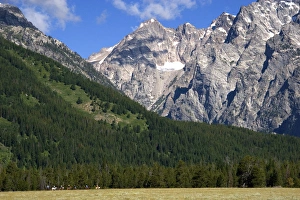 Horseback riding in Grand Teton National Park, Wyoming beneath Mt. Moran Horseback riding in Grand Teton National Park, Wyoming beneath Mt. Moran