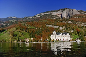 Hotel in autum along shore of Lake Lucerne from sightseeing boat, Lake Lucerne, Switzerland Hotel in autum along shore of Lake Lucerne from sightseeing boat, Lake Lucerne, Switzerland