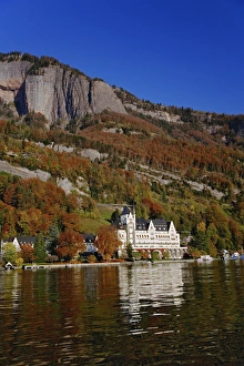Hotel in autumn, along shore of Lake Lucerne from sightseeing boat, Lake Lucerne Hotel in autumn, along shore of Lake Lucerne from sightseeing boat, Lake Lucerne