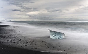 Vatnajokull Gallery: icebergs on black volcanic beach. Beach of the north atlantic near the glacial lagoon Joekulsarlon