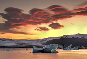 Icebergs from the Jokulsarlon glacier adrift in sunset in Jokulsarlon lagoon in Iceland Icebergs from the Jokulsarlon glacier adrift in sunset in Jokulsarlon lagoon in Iceland