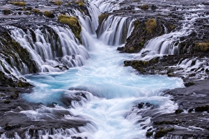 Iceland, Bruarfoss. Waterfalls flow into river Iceland, Bruarfoss. Waterfalls flow into river