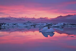 Images Dated 15th July 2010: Iceland, Hofn. Sunset over the Jokulsarlon Glacier lagoon