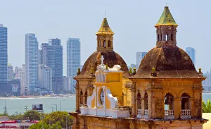 Iglesia de San Pedro Claver in the old town, high-rises of the new city in the background Iglesia de San Pedro Claver in the old town, high-rises of the new city in the background