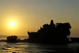 Images Dated 24th August 2011: Indonesia, Bali, Tabanan. Tanah Lot temple at sunset