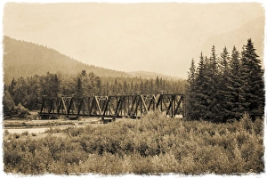 An iron rail crossing bridge in vintage sepia, Alaska An iron rail crossing bridge in vintage sepia, Alaska