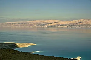 Israel, Dead Sea, along the read on the Israeli side, Jordan across the body of water Israel, Dead Sea, along the read on the Israeli side, Jordan across the body of water