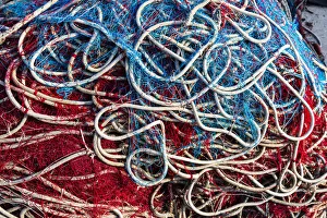 Italy, Apulia, Province of Lecce, Gallipoli. Texture detail of fishing nets in red, white Italy, Apulia, Province of Lecce, Gallipoli. Texture detail of fishing nets in red, white