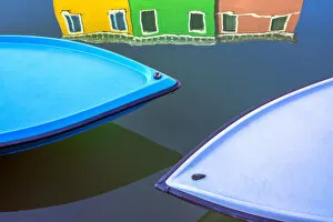 Burano Gallery: Italy, Burano. Boat bows and house reflection in canal