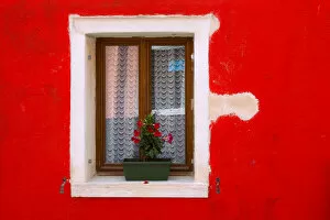 Burano Gallery: Italy, Burano. Colorful house wall and window