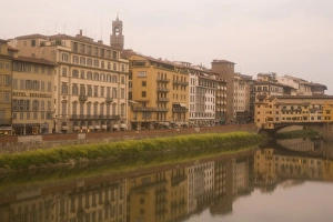 Italy, Florence. Buildings reflect in the Arno River Italy, Florence. Buildings reflect in the Arno River