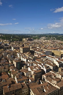 Italy, Florence. Looking southwwest over the city rooftops from Brunelleschis Dome Italy, Florence. Looking southwwest over the city rooftops from Brunelleschis Dome