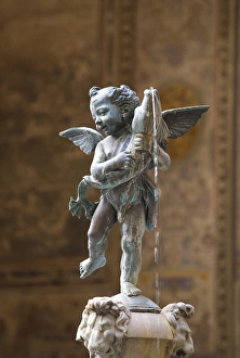 Italy, Florence. Verrocchios statue of boy with dolphin Italy, Florence. Verrocchios statue of boy with dolphin