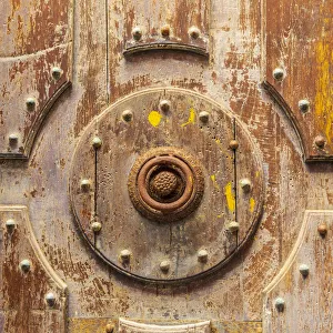 Italy, Sicily, Palermo Province, Cefalu. Detail of an exterior wooden door on the Cefalu Italy, Sicily, Palermo Province, Cefalu. Detail of an exterior wooden door on the Cefalu