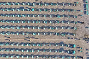 Italy, Tuscany, Torre del Lago Puccini, boathouse and neatly ordered beach chairs Italy, Tuscany, Torre del Lago Puccini, boathouse and neatly ordered beach chairs