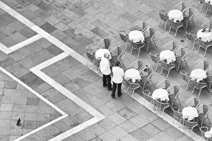 Italy, Venice. Black and white looking down on waiters in San Marco Square from Campanile Italy, Venice. Black and white looking down on waiters in San Marco Square from Campanile
