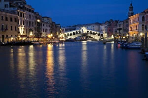 Grand Canal Gallery: Italy, Venice. Venices iconic Rialto Bridge at twilight