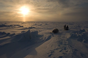 Jack Kayotuk and Alice Faith on frozen landscape on the Arctic ocean, off Herschel island Jack Kayotuk and Alice Faith on frozen landscape on the Arctic ocean, off Herschel island