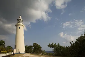 Jamaica, Negril, Afternoon sun lights lighthouse on bluff overlooking Caribbean Sea Jamaica, Negril, Afternoon sun lights lighthouse on bluff overlooking Caribbean Sea