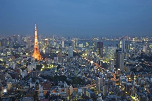 Japan, Tokyo. Sunset aerial of downtown including Tokyo Tower and Rainbow Bridge Japan, Tokyo. Sunset aerial of downtown including Tokyo Tower and Rainbow Bridge