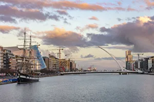 Jeanie Johnston Tall Ship and Samuel Beckett Bridge over the River Liffey in downtown Jeanie Johnston Tall Ship and Samuel Beckett Bridge over the River Liffey in downtown