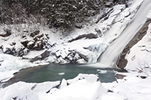 The Krimml waterfalls in the National Park Hohe Tauern during winter in ice and snow The Krimml waterfalls in the National Park Hohe Tauern during winter in ice and snow