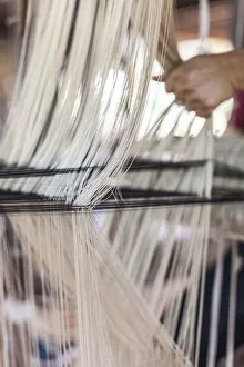Laos, Vientiane. Traditional Lao textile loom Laos, Vientiane. Traditional Lao textile loom