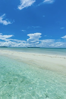 Little sand strip appearing in Low tide at the Rock islands, Palau, Central Pacific Little sand strip appearing in Low tide at the Rock islands, Palau, Central Pacific