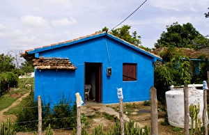 Local house painted blue in small village of Manaca Iznaca Estate home of the Plantation Local house painted blue in small village of Manaca Iznaca Estate home of the Plantation