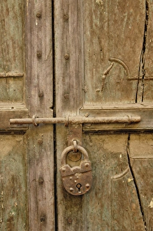Locked door in a small gully (alley) in Delhi, India Locked door in a small gully (alley) in Delhi, India