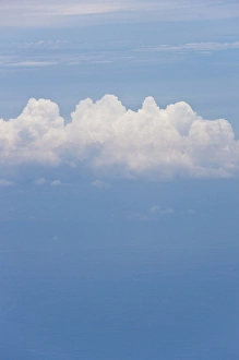 A lone Cumulus cloud high above the Pacific Ocean A lone Cumulus cloud high above the Pacific Ocean